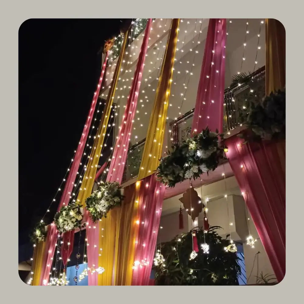 Premium Shadi Celebration Home Decor with Fabric Drapes and Floral Accents