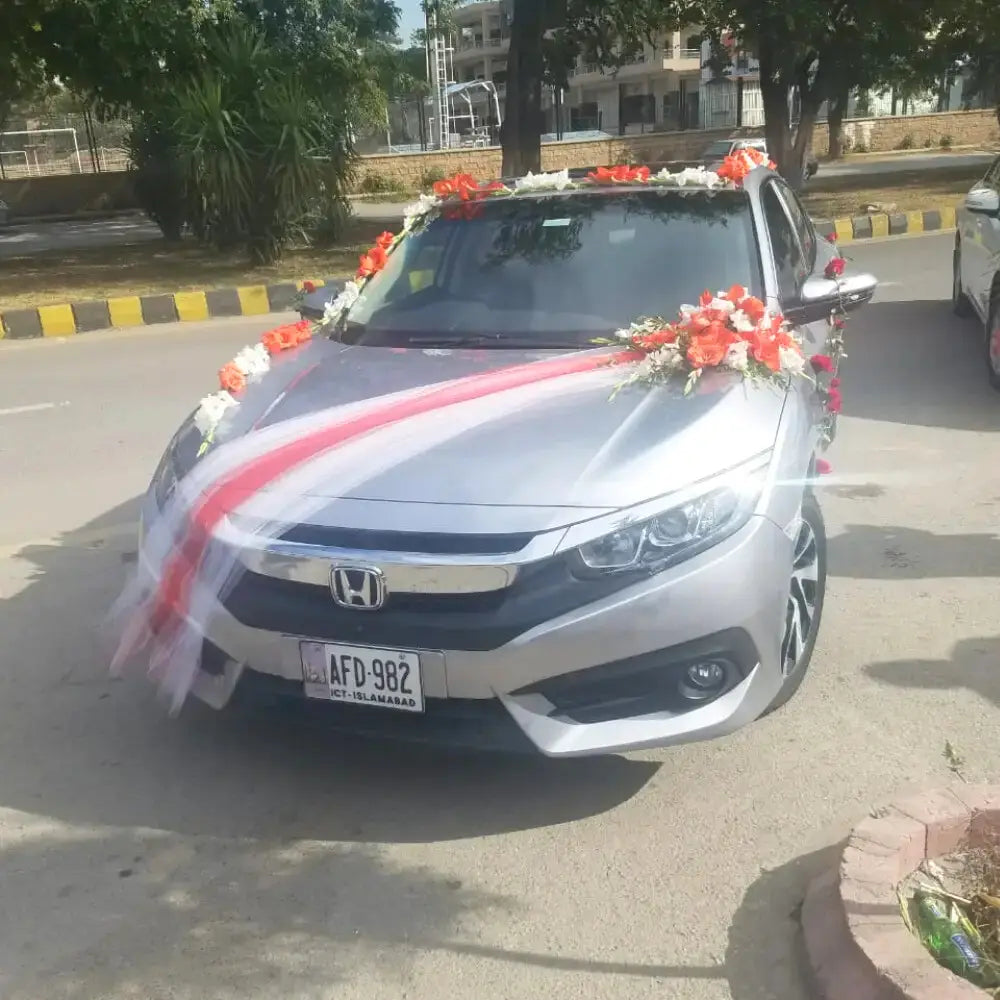 Elegance on Wheels | Premium Wedding Car Floral Artistry