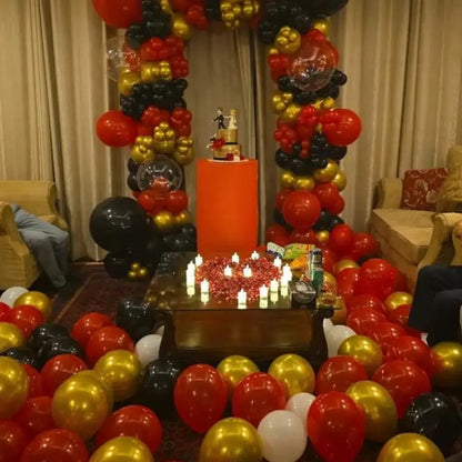 Elegant Red, Gold, and Black Birthday Decor Inspiration