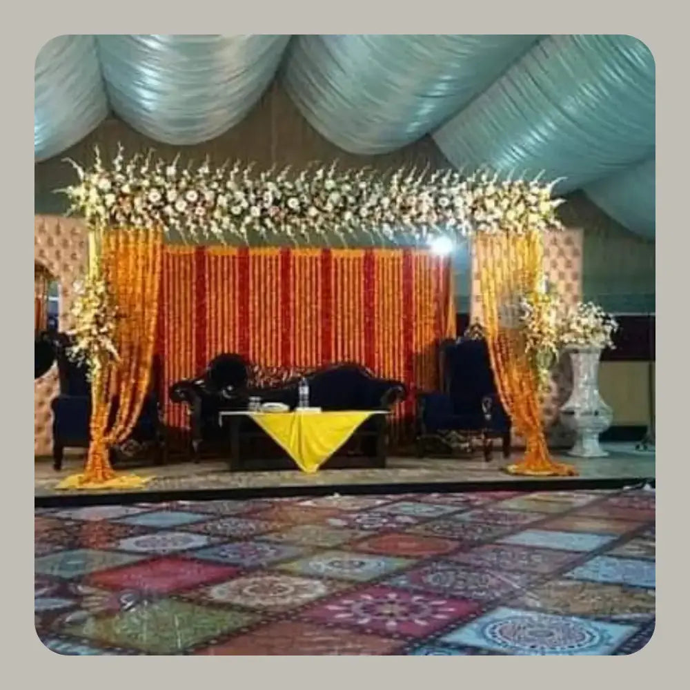 Traditional Marigold Backdrop Mehndi Stage with Navy Blue Velvet Seating