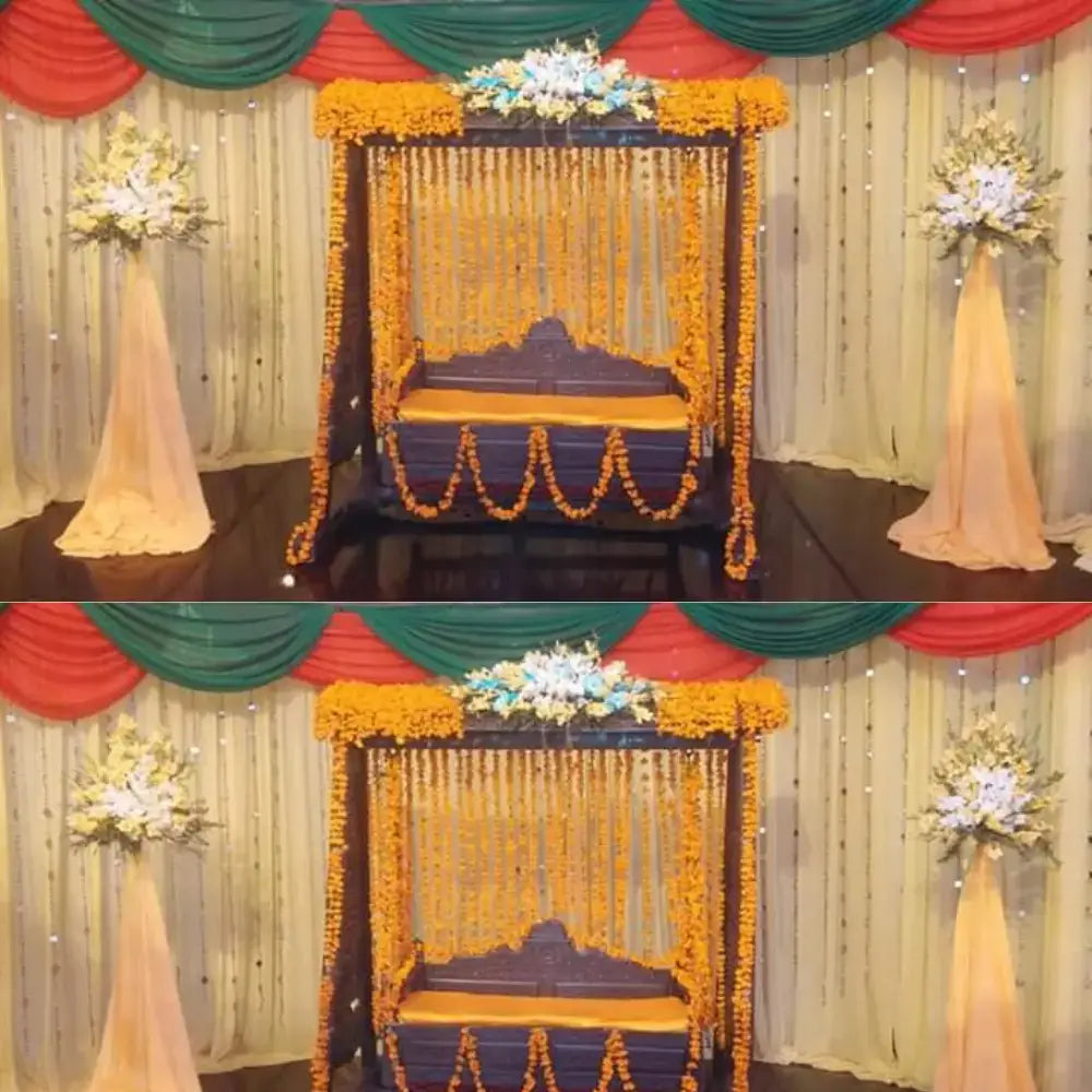 Traditional Wooden Mehndi Jhoola with Marigold Garlands and Drapery