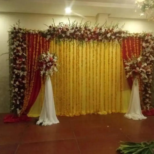 Grand Marigold Circular Arch Mehndi Stage with Royal Gold Seating