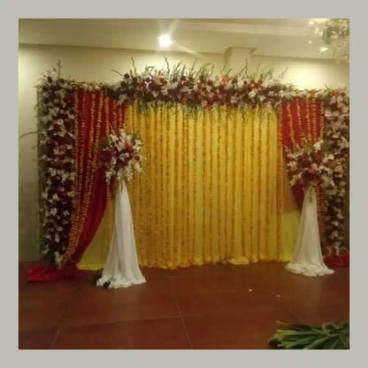 Grand Marigold Circular Arch Mehndi Stage with Royal Gold Seating
