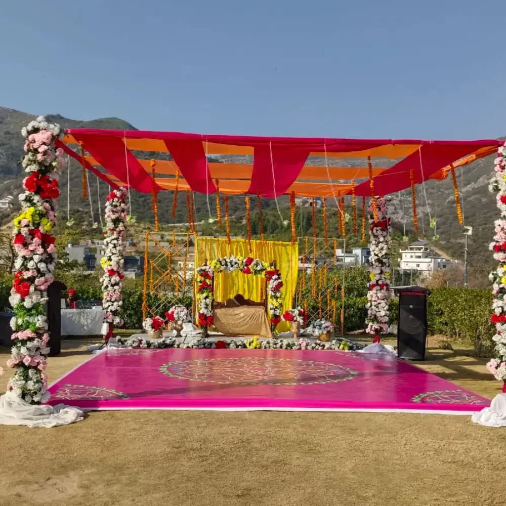 Outdoor Luxury Mehndi Canopy with Floral Pillars and Printed Dance Floor