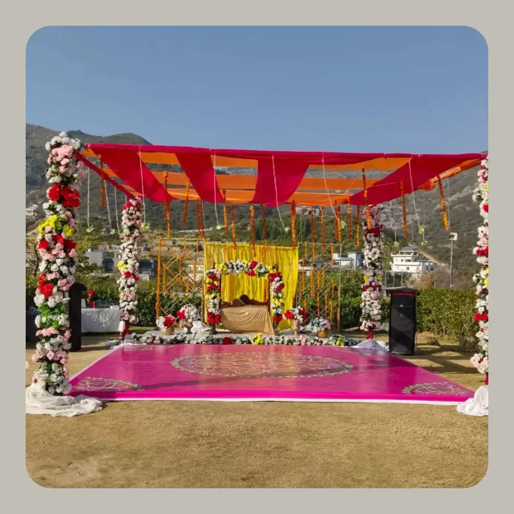 Outdoor Luxury Mehndi Canopy with Floral Pillars and Printed Dance Floor