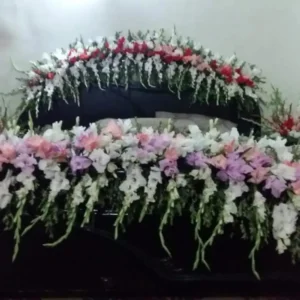 Bridal Bed Decoration with Gladiolus and Rose Floral Arch and Cascading Garland