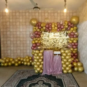 Gold Sequin Wall Decoration with Gold and Rose Balloon Frame and Pink Glitter Tables