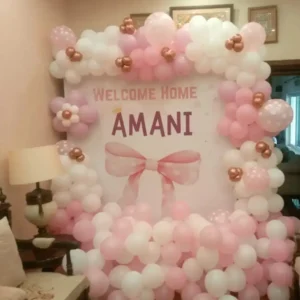 Welcome Home Decoration with Pink Bow Backdrop and Pink, White and Rose Gold Balloon Frame