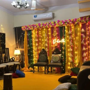 Home Dholki Decoration with Neon Sign, Floral Border, Hanging Tassels and Fairy Lights